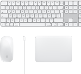 Vista desde arriba de un Magic Mouse, un cable USB-C, un Magic Trackpad y un Magic Keyboard con teclado numérico